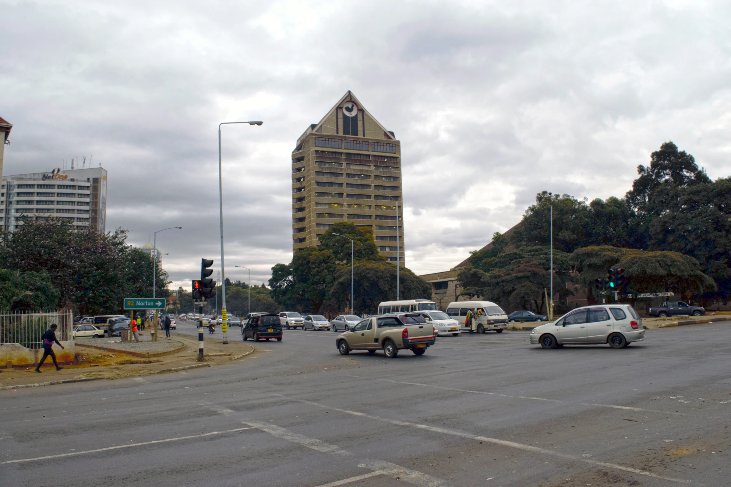 A busy street in central Harare with office towers